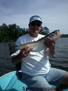 Johnny Williamson, of Pink Hill, NC, with a speckled trout that bit a Gulp bait in the New River near Jacksonville.