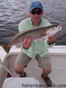 Brewster Humphries, of Beulaville, NC, with a citation speckled trout that bit a MirrOlure She Pup in the New River while he was fishing with Capt. Allen Jernigan of Breadman Ventures.