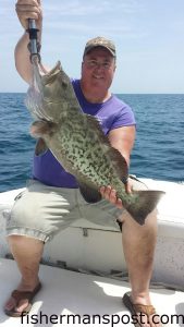 David Curran, of Oxford, NC, with a 13 lb. gag grouper that struck a live menhaden at some bottom structure in 70' of water off Drum Inlet. He was fishing with Capt. Chris Kimrey of Mount Maker Charters.