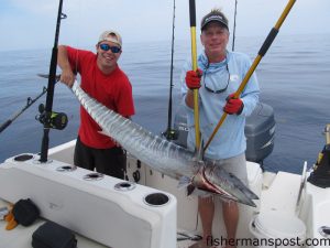 Connor and Eddie Jones, of Farmville, NC, with a wahoo that attacked a skirted ballyhoo while they were trolling the Gulf Stream off Beaufort Inlet.