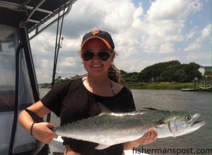 Audrey Black, of Mt. Holly, NC, with a 7.80 lb. spanish mackerel that she hooked on a live bait while fishing a nearshore reef of Oak Island with her twin brother, father, and grandfather.