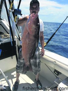 Ray Zeng, of Shallotte, NC, with a cubera snapper that he hooked while bottom fishing 50 miles off Shallotte Inlet.