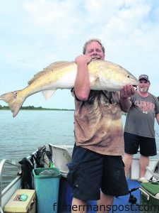 Bill Wagner with a large red drum that he hooked on a live mud minnow in the ICW near the Ocean Isle bridge.