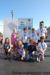 The Junior Anglers who participated in the 2014 Wide Open Tech Spanish Mackerel Open with the medals and Blue Water Candy prize packs they earned for weighing in fish in the event.