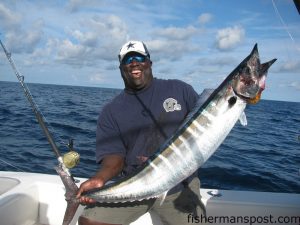 Tracy Dula, of Charlotte, NC, with a 53 lb. wahoo that bit a ballyhoo behind a Blue Water Candy JAG in 200' of water near the Same Ol' Hole. He was fishing off Wrightsville Beach with Capt. Mike Jackson of Live Line Charters.