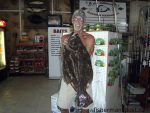 David Derrick, of Oak Island, NC, with a 12 lb. flounder he hooked while fishing near Oak Island. Photo courtesy of Wildlife Bait and Tackle.