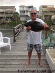 Frank Westmoreland, of Greensboro, NC, with a 23" flounder that bit a Gulp bait inshore at Ocean Isle Beach.