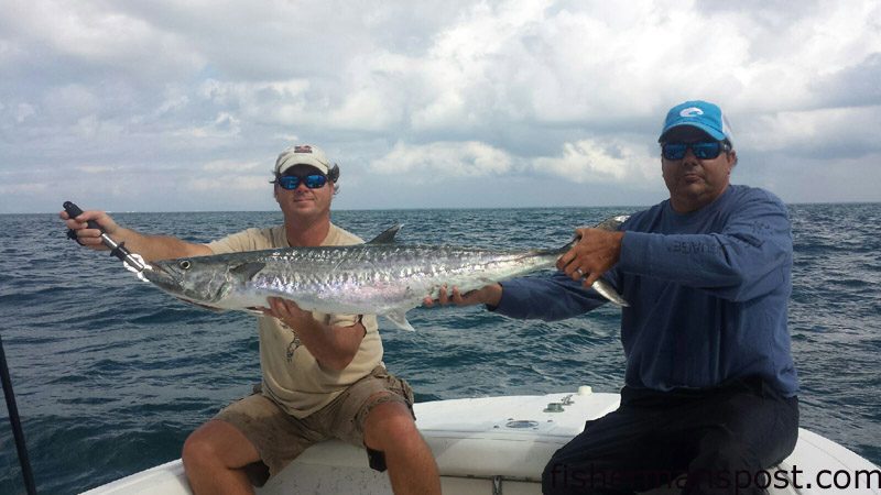 Brian Villeneuve and Brinkley Willis with Brian’s first king mackerel. The king attacked a live menhaden just outside Beaufort Inlet while they were fishing with Capt. Chris Kimrey of Mount Maker Charters.