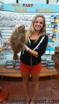 Samantha Ducharme, of Detroit, MI, with her first flounder, a 19" fish that bit cut shrimp off Seaview Pier.