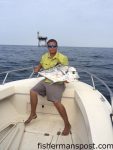 Jakob Puskas with an African pompano that bit a live bait near Frying Pan Tower while he was fishing with his uncle Brian.