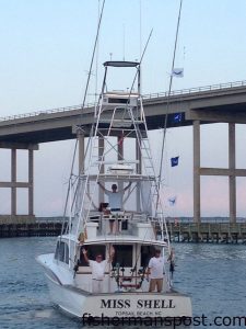 William and Wayne Reynolds and Brantley Guinn celebrate a grand slam of billfish releases they found off Oregon Inlet in late August while trolling aboard the "Miss Shell."