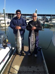 Chris and Morgan Hunt with 31 and 29 lb. king mackerel that struck live menhaden just off Topsail Beach while they were fishing with Capt. Dave Timpy on the "Wavelength."