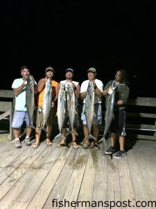 Howard and Tyler Crumpler, Will and Gene Rivenbark, and Jaycob Rochelle with 23, 23, 27, 20, 26, and 23 lb. king mackerel they hooked recently while live-baiting from the end of Surf City Pier.