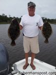 Jeff Wood, of Jacksonville, NC, with 6 and 3.5 lb. flounder he hooked on live finger mullet in Browns Inlet.