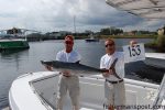 Chad Barnes and John Lewis--Morehead City's "Second Chance" Fishing Team--with the 44.54 lb. king mackerel that earned them the tournament's top prize. Their big fish struck a live bluefish a short distance off the beach at Oak Island.