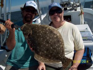 Terry Dailey landed this 7 lb., 8 oz. flounder after it struck a cut bait while she was fishing in Oregon Inlet with Capt. Aaron Kelly of Rock Solid Charters.