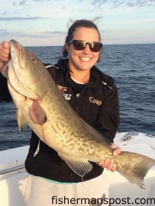 Drew Hudspeth, of Wilmington, with a 33" gag grouper that bit a live cigar minnow in 70' of water off Masonboro Inlet while she was fishing with Bryan Williams on the "Trigger Happy."