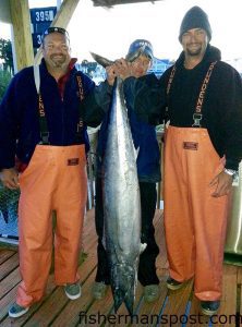 Bryan Freeman, Tim Gallimore, and Daniel Simmons with a 68.2 lb. wahoo that attacked a ballyhoo near the Steeples while they were fishing out of Ocean Isle Beach on the "Reel McCoy."