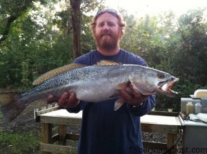 Clint Piner with an 8.8 lb. speckled trout that bit a MirrOlure in the ICW near Carolina Beach.