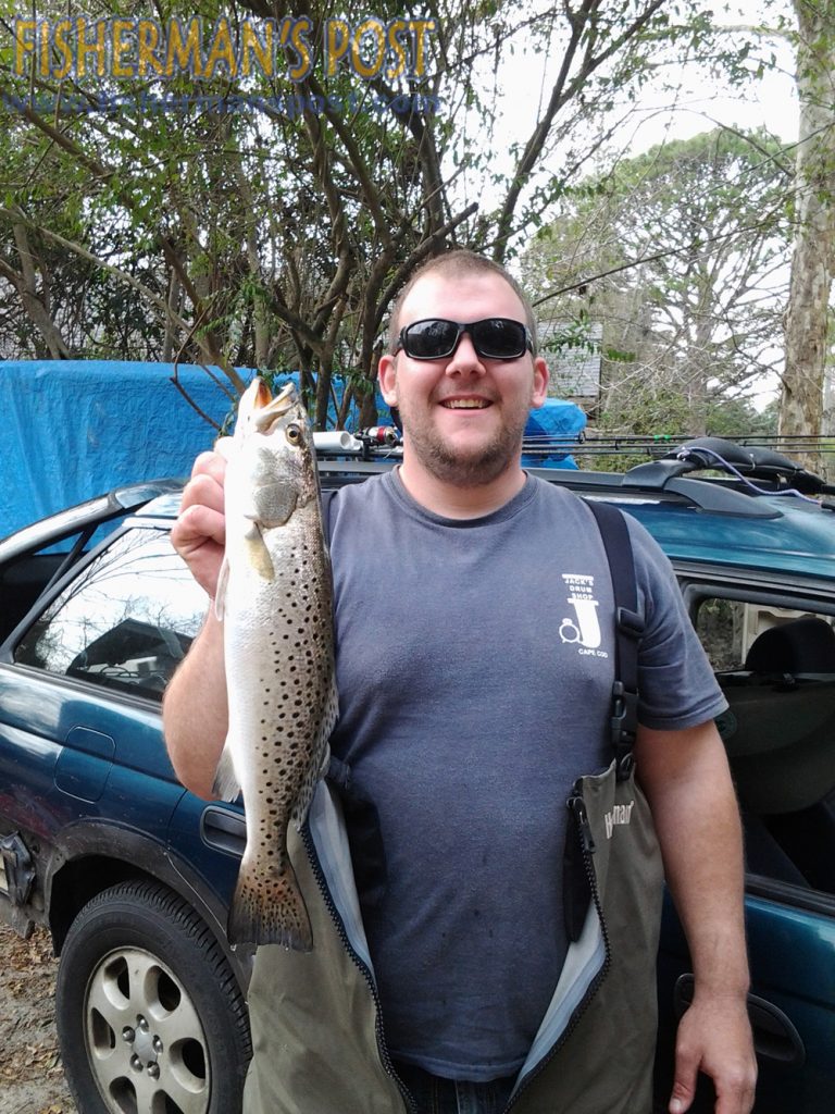 Patrik Wood with a 19" speckled trout that fell for a white Gulp jerk shad in a creek near Wrightsville Beach.