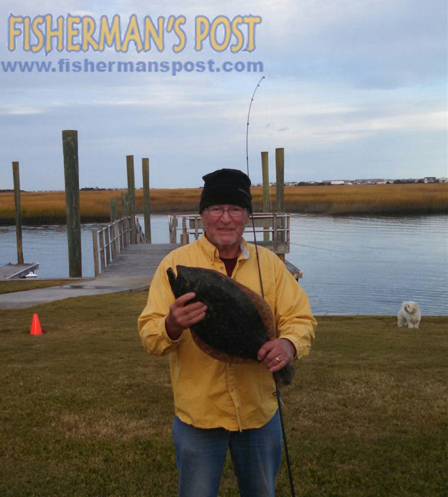 Richard Walton, of Seaview Pier, with a near-5 lb. flounder that bit a Gulp Shrimp off a Wrightsville Beach dock.