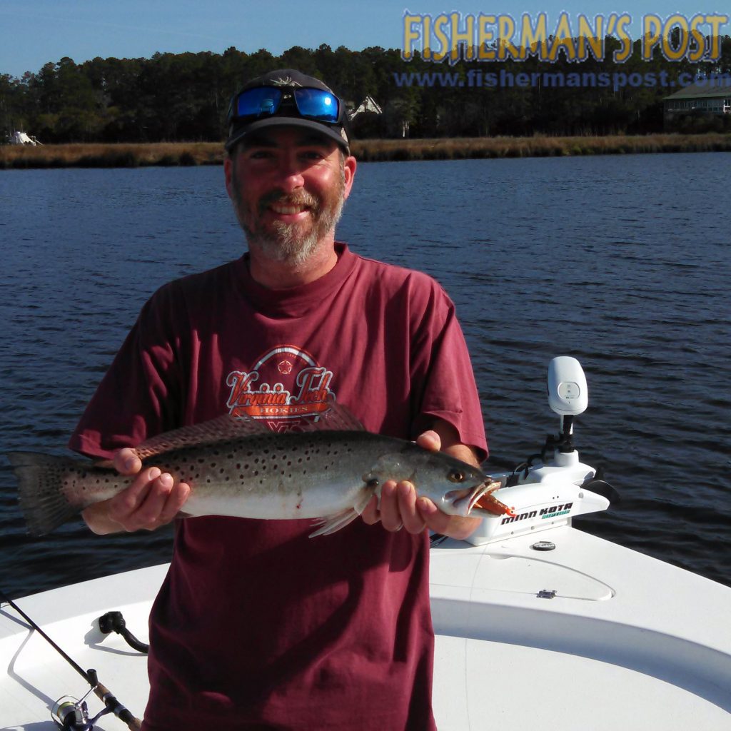 Mike Wells with a speckled trout that struck a Z-Man soft plastic in the ICW near Beaufort while he was fishing with Capt. Justin Ragsdale of Breakday Charters.