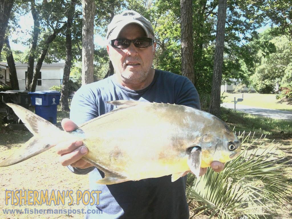 Tony Cherry, of Belmont, NC, with a 3.5 lb., 17" pompano that struck a grub/cut bait combo in the Oak Island surf. The fish was measured and submitted for an NC Citation at Oak Island Pier.