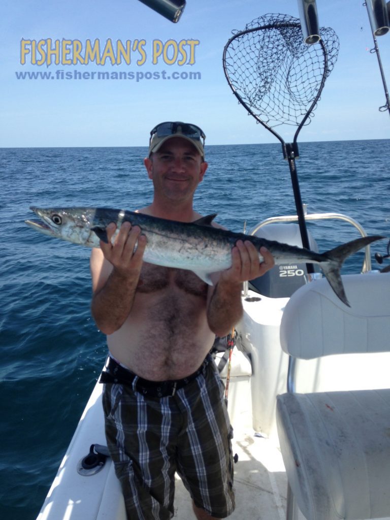 Ryan Hocker with a king mackerel that struck a cigar minnow off Atlantic Beach.