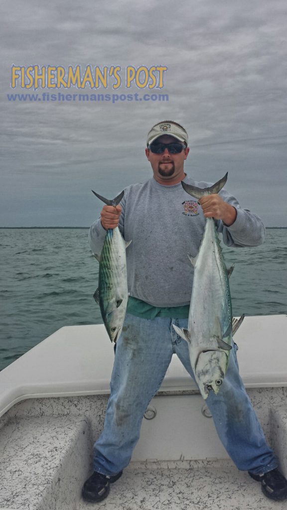 Kevin Wade, of Erwin, NC, with an Atlantic bonito and a little tunny that struck Stingsilvers while he was fishing just off New River Inlet.