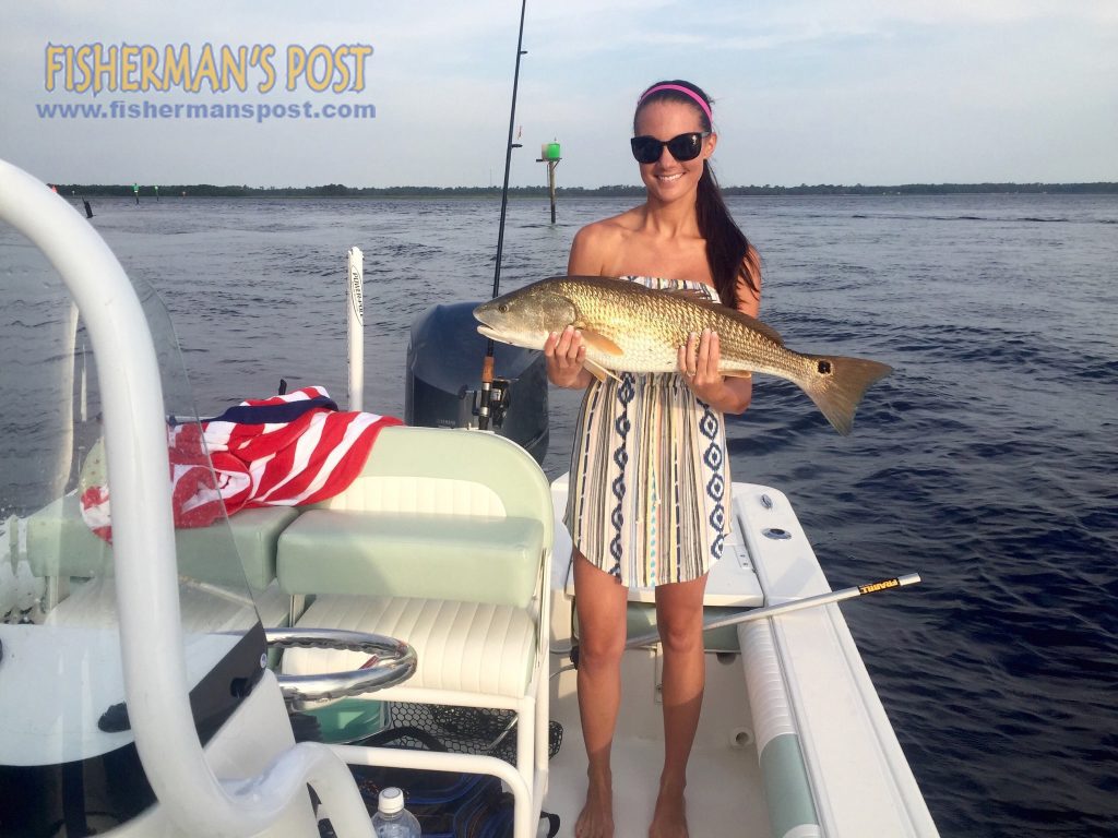 Brittany Brown with an over-slot red drum she hooked while fishing in the Cape Fear River with her fiance, Carter Pigford of Cape Fear RV and Marine.