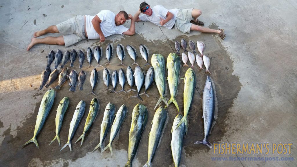 Jeff McDonald and Jonathan Morton with dolphin, tuna, a wahoo, and assorted bottomfish, results of a trip offshore of the Blackjack Hole in 300' of water.