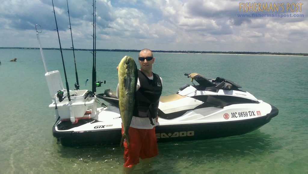 Brad Weathersby, of Raleigh, with a 10 lb. dolphin he hooked while trolling a cigar minnow on a South Chatham Tackle Pirate Plug from his sea doo near AR-362.