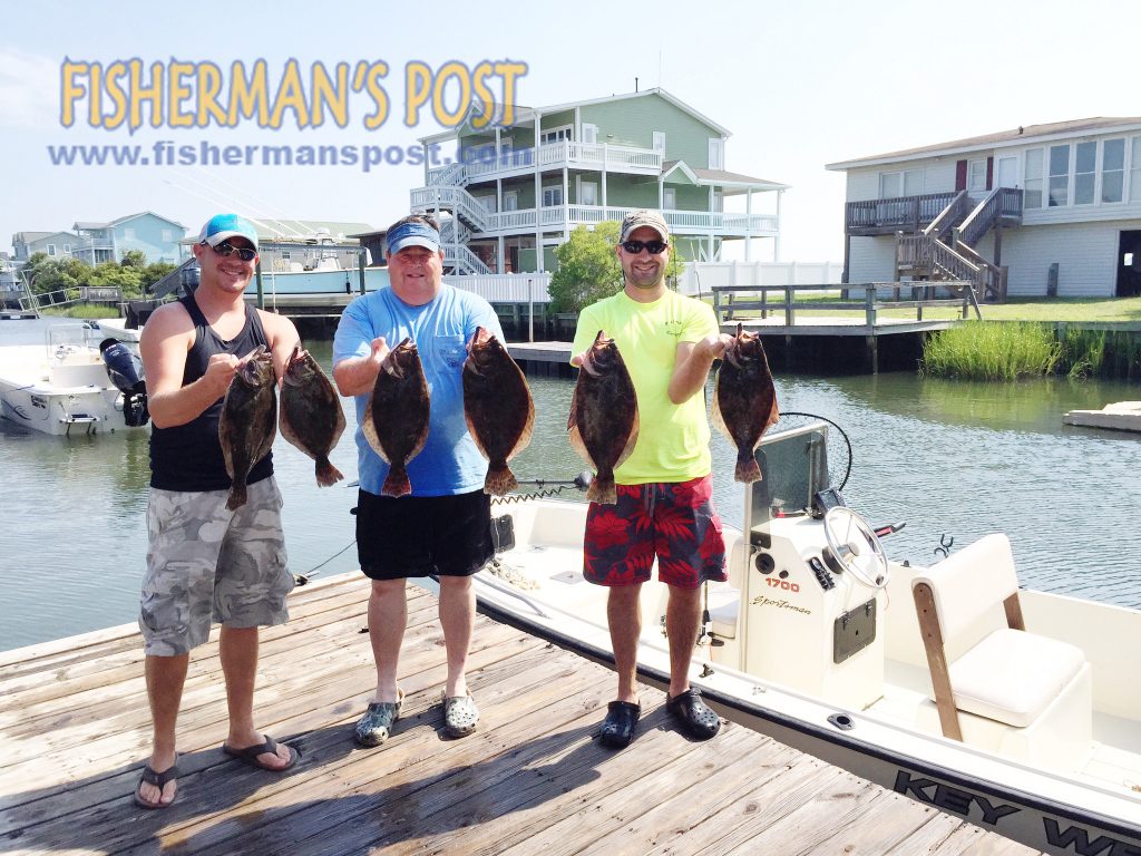 Brian, Tony, and Adam Green, of Sophia, NC, with flounder they landed while fishing inshore at Ocean Isle Beach with live finger mullet.