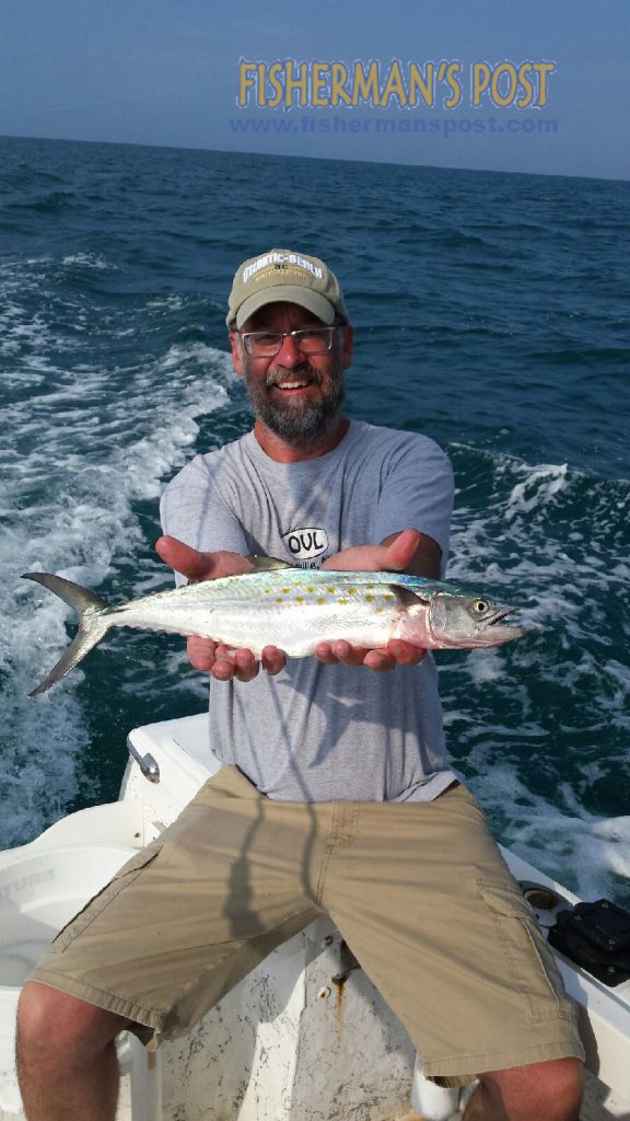 Dennis Rogers with a spanish mackerel he hooked on a casting jig while fishing near Cape Lookout with Capt. Chris Kimrey of Mount Maker Charters.