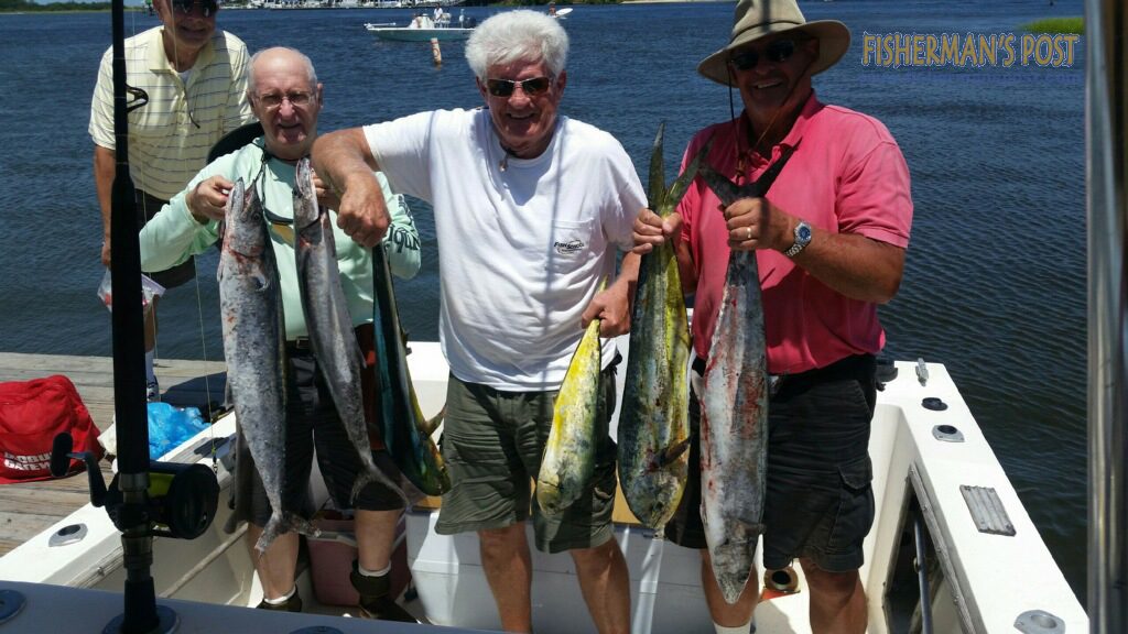 Bob MacFarland, Bernie Droshe, James Lister, and D. Hoff with king mackerel and dolphin they hooked while trolling ballyhoo 20 miles off Carolina Beach with Capt. Rod Bierstedt of OnMyWay Charters.