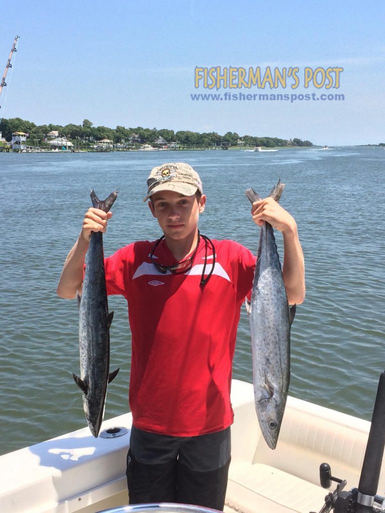 Riley Aldridge with a pair of king mackerel that struck #2 Clarkspoons while he was trolling 5 miles off Wrightsville Beach with Capt. Jim Sabella of Plan 9 Charters.