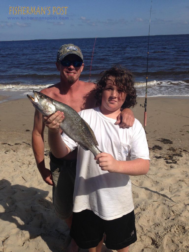 Ivey Creech with his first speckled trout, a 22" fish that struck a live mud minnow in the Cape Fear River.