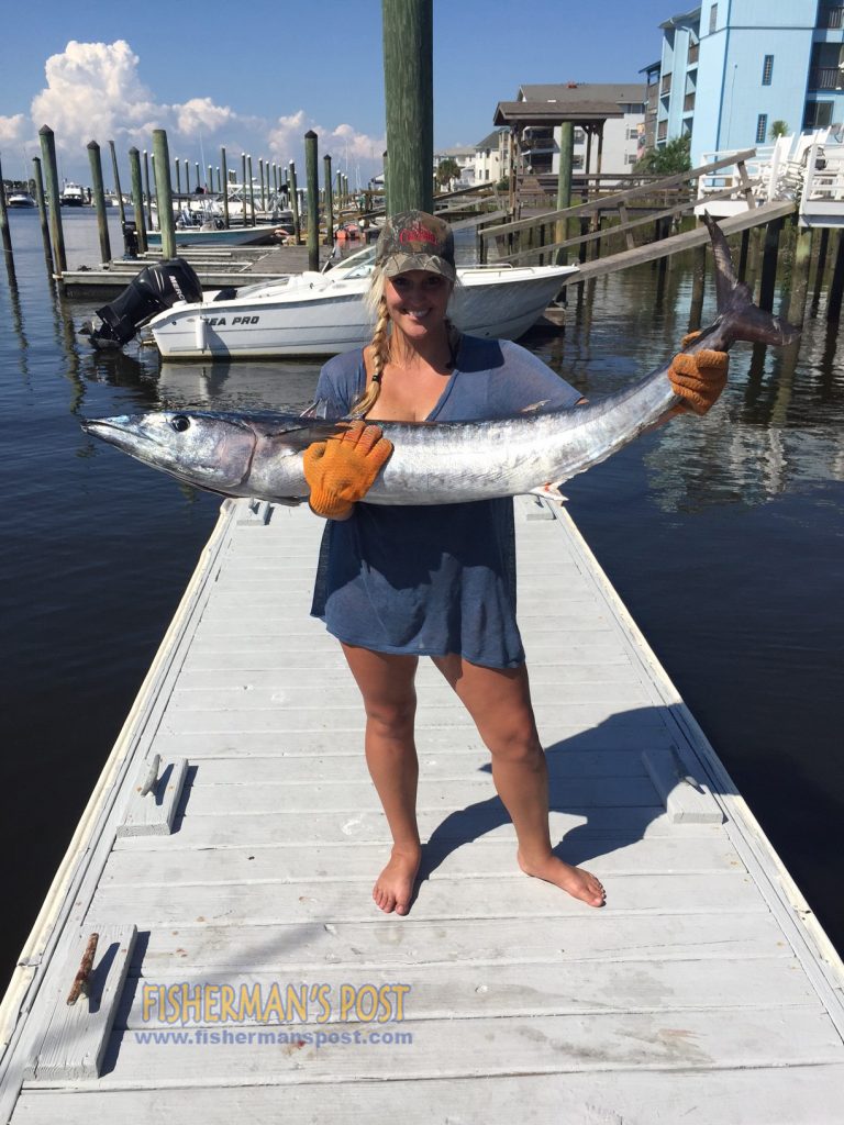 Rena Anderson with a 47 lb. wahoo that attacked a rigged ballyhoo 13 miles off Carolina Beach Inlet while she was trolling on the "Fishin Coalition" with Jason White and Dan Bowman.