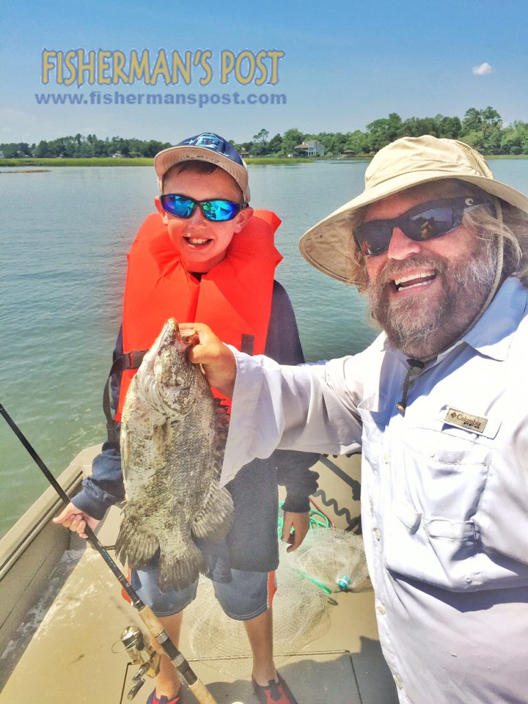 Chase Lee, of Garner, NC, and Chuck Wilson with an 18" tripletail Chase landed in Pages Creek.