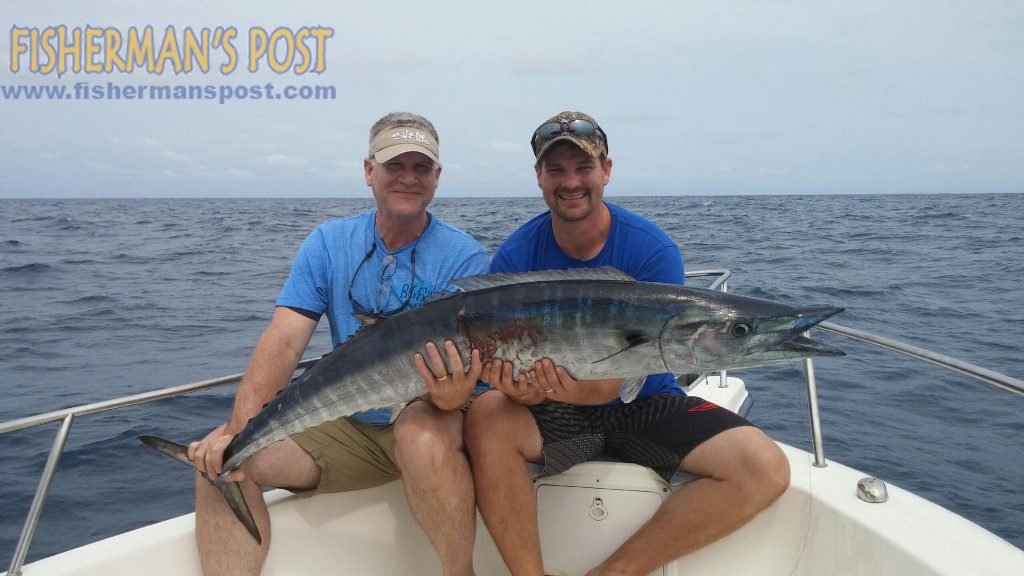 Bryan and Kris Gurley with a 37.4 lb. wahoo that struck a dead cigar minnow near the Horseshoe Reef off Southport while they were fishing with Scott Gurley and Reid Goodman on the "No Slack."