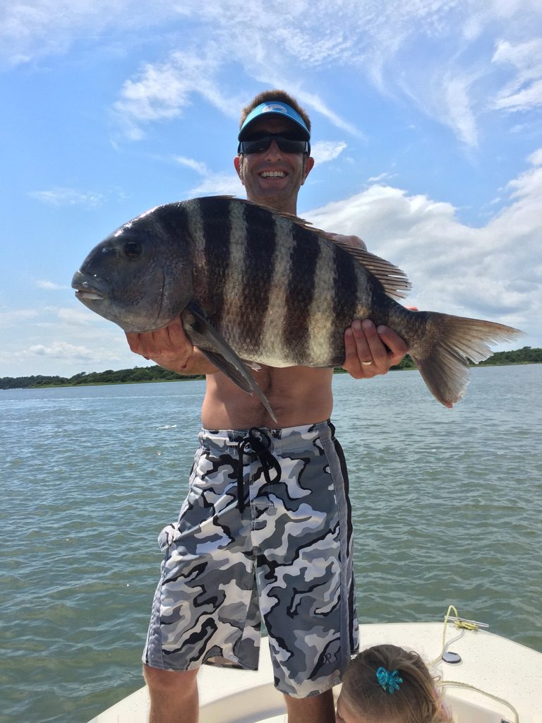 Dusty Long, of Summerfield, NC, with an 11. lb., 3 oz. sheepshead he landed while fishing the ICW near Emerald Isle.