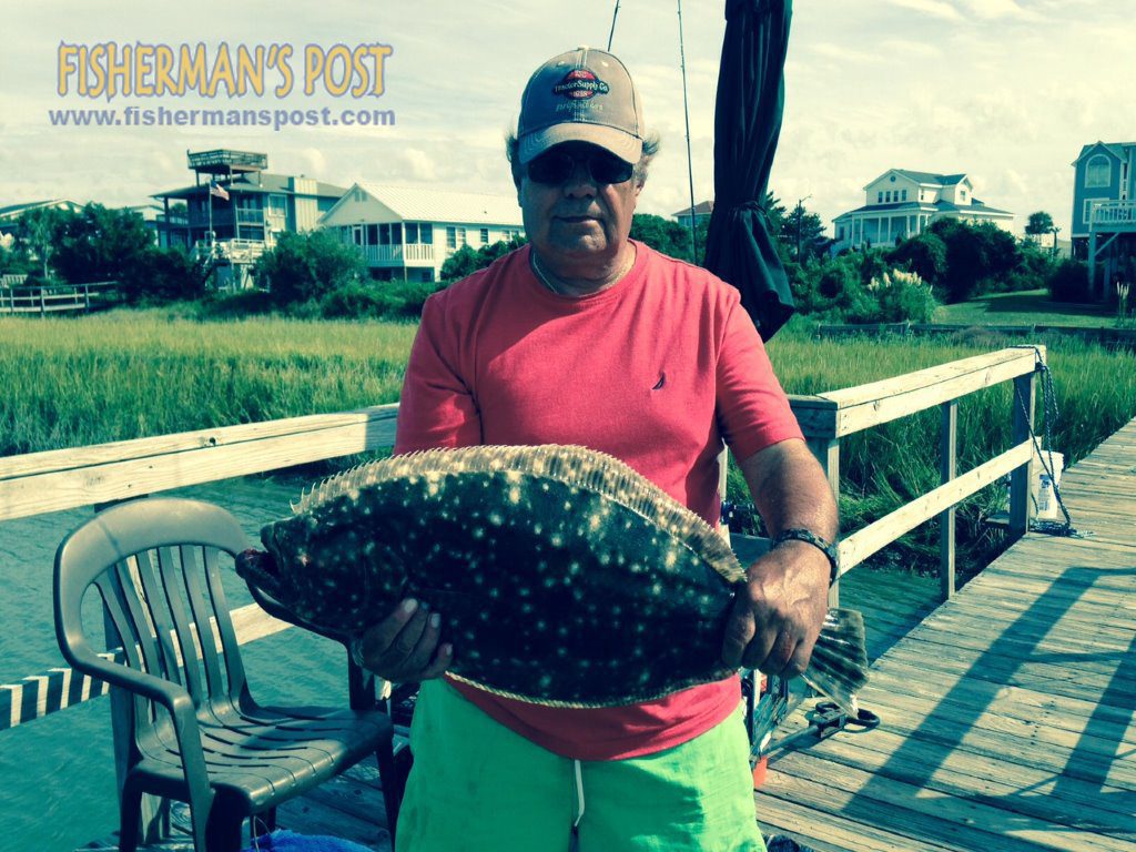 Tommy Furr, of Charlotte, NC, with an 8 lb., 3 oz. flounder that attacked a Gulp Mantis Shrimp in Lockwood Folly Inlet.