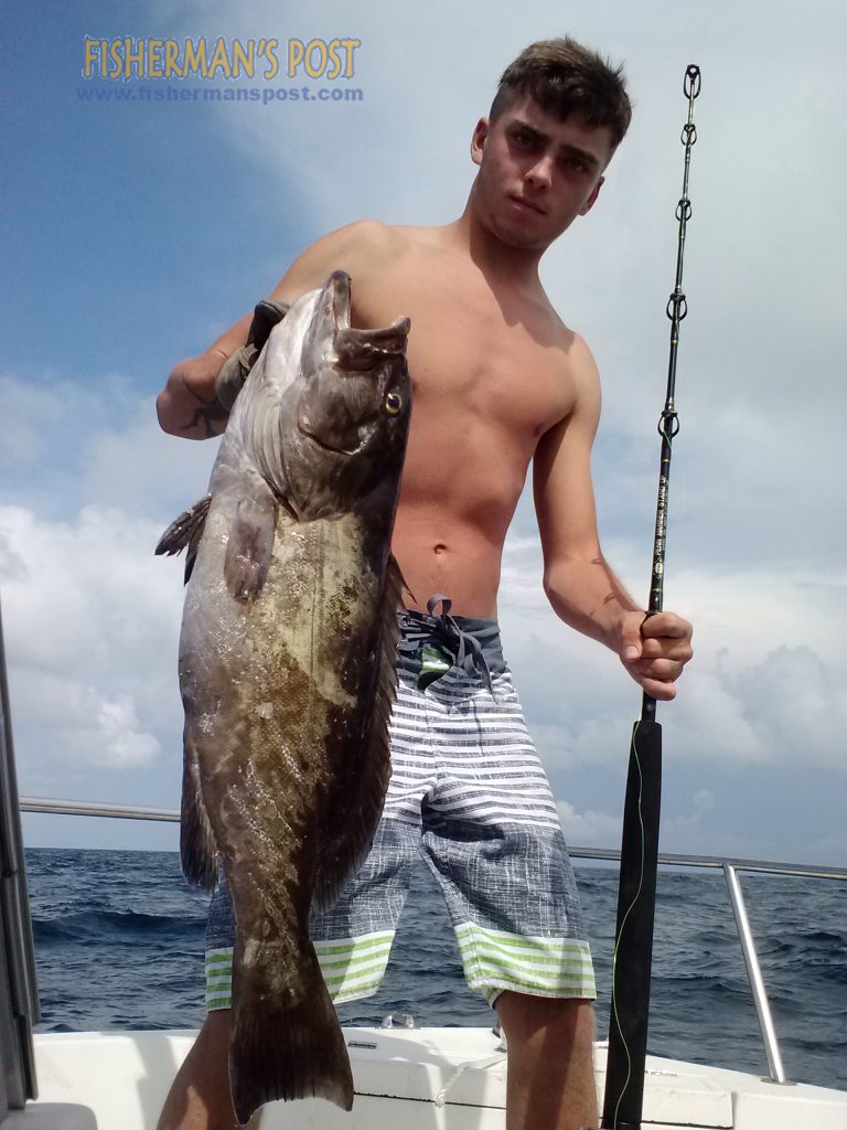 Tyler Powers, of Wilmington, with a gag grouper he landed while dropping a cut bait to some bottom structure 8 miles off Wrightsville Beach.