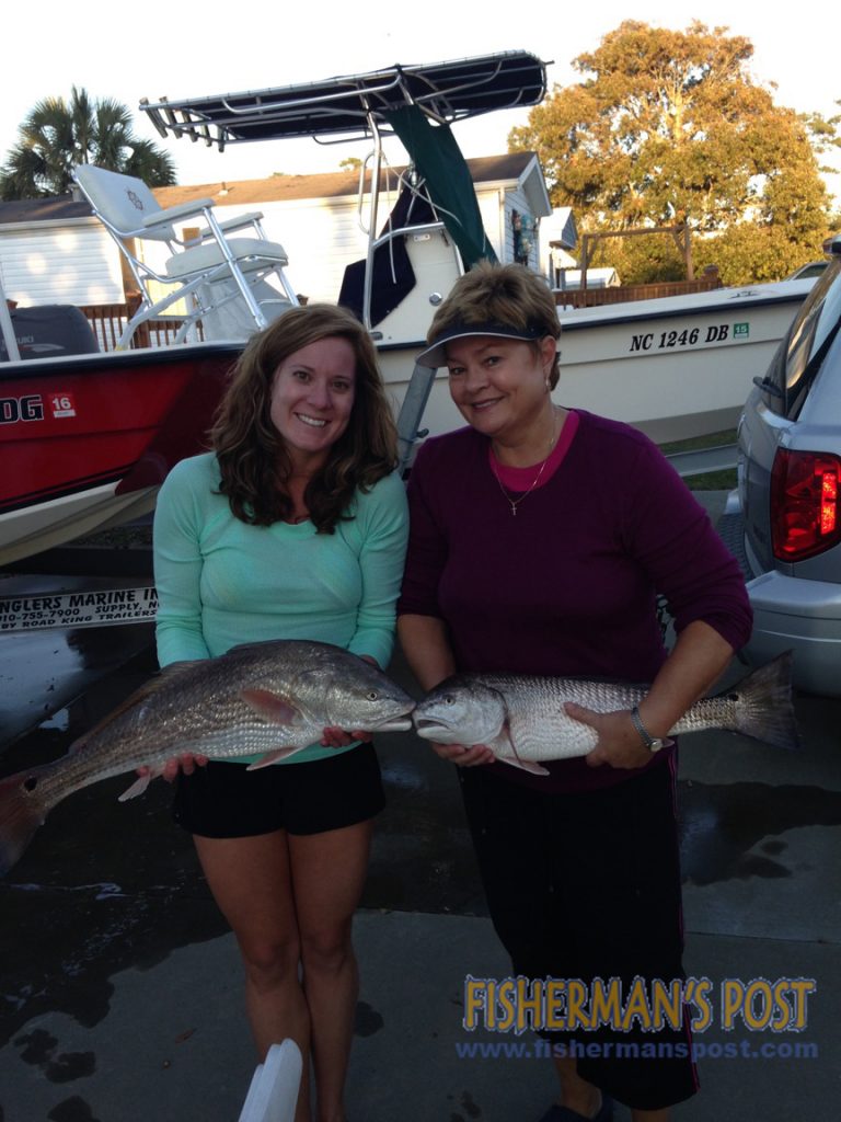 Jenny and Beverly Westbrook with a pair of red drum that they landed while fishing in Bogue Inlet.