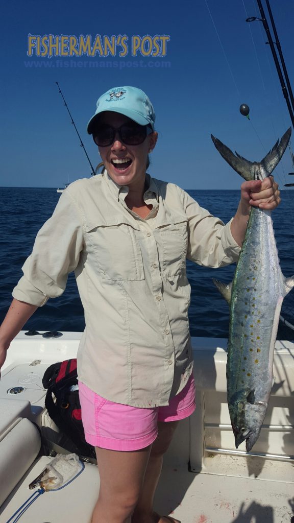 Laura Baker, of Raleigh, NC, with a 5.73 lb. spanish mackerel she hooked on a live bait while fishing some nearshore structure off Beaufort Inlet.