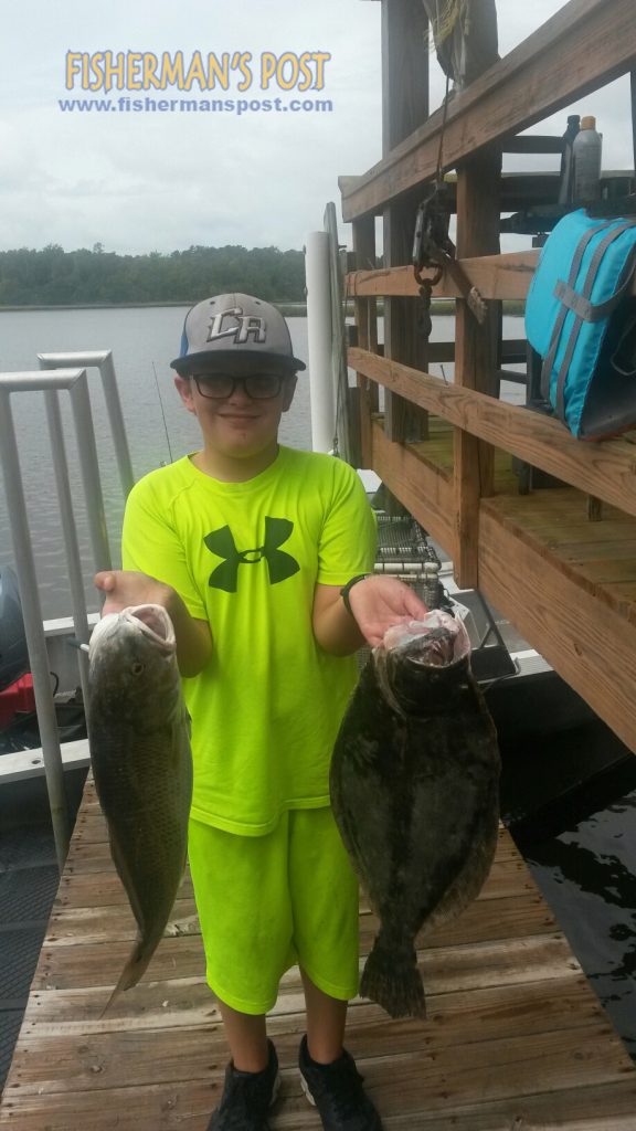 Zachary Helms (age 9) with a citation 5 lb., 10 oz. flounder and a 24" red drum he hooked in the ICW near Holden Beach while fishing with his grandfather.