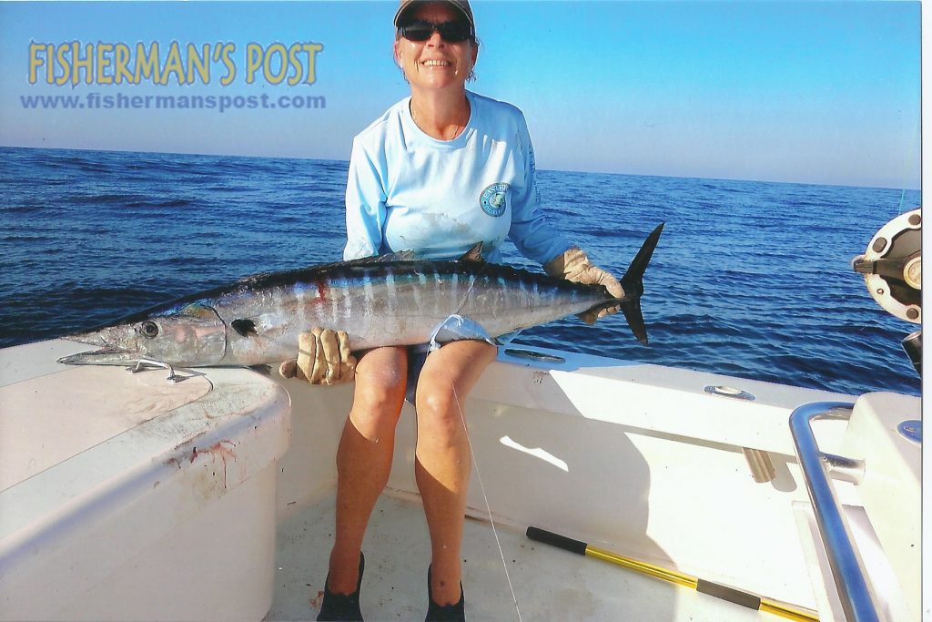 Sherri Jones, of Jacksonville, NC, with a wahoo she landed while trolling off Morehead City near the Big Rock aboard the "Baby Blue."